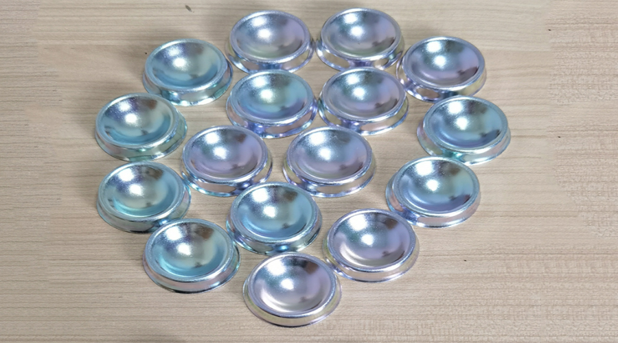 During the application of potassium chloride-based zinc plating brighteners, what should be done if the current cannot be increased and the coating tends to burn?